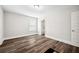 Empty bedroom space with hardwood floors and neutral walls at 283 Saxony Loop, Summerville, SC 29486