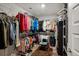 Organized walk-in closet features hanging racks, wire shelving, and a chair with a rug at 283 Saxony Loop, Summerville, SC 29486