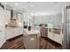 Modern kitchen with stainless steel appliances, granite counters, and center island at 283 Saxony Loop, Summerville, SC 29486