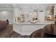 Open kitchen concept with bright white stone countertops and stainless steel appliances at 283 Saxony Loop, Summerville, SC 29486
