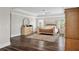 Bright and airy main bedroom featuring wood floors and tray ceiling at 283 Saxony Loop, Summerville, SC 29486