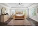 Main bedroom featuring wood floor, recessed lights, and ample windows at 283 Saxony Loop, Summerville, SC 29486