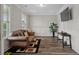 Cozy sitting room with hardwood floors and natural light at 283 Saxony Loop, Summerville, SC 29486