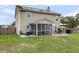 Spacious backyard with solar panels, screened porch and outdoor seating at 301 Edenton Rd, Goose Creek, SC 29445