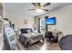 Cozy bedroom offers a ceiling fan, large mirror, and convenient desk space at 301 Edenton Rd, Goose Creek, SC 29445