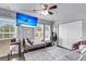 Comfortable bedroom featuring a ceiling fan, large windows, and a daybed at 301 Edenton Rd, Goose Creek, SC 29445