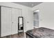 Bedroom with built-in closet storage and a large mirror at 301 Edenton Rd, Goose Creek, SC 29445