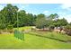 Scenic walking path next to a bike rack that leads to a play area and more at 301 Edenton Rd, Goose Creek, SC 29445