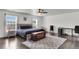 Spacious main bedroom features hardwood floors, modern furnishings, and large windows allowing ample natural light at 301 Edenton Rd, Goose Creek, SC 29445
