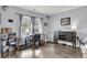 Bright home office featuring hardwood floors, stylish decor, and natural light at 301 Edenton Rd, Goose Creek, SC 29445