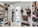 Walk-in closet leading to the bathroom, offering shelves, rods, and compartments for clothes, hats, and accessories at 301 Edenton Rd, Goose Creek, SC 29445