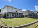 Backyard with a screened-in porch, pergola, and space for outdoor activities and relaxation at 301 Mondo Ct, Summerville, SC 29486