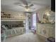 Bright bedroom with bunkbeds, storage and a ceiling fan at 301 Mondo Ct, Summerville, SC 29486