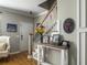 Foyer featuring hardwood flooring, a decorative console table, staircase, and South Carolina decor at 301 Mondo Ct, Summerville, SC 29486