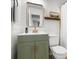 Charming bathroom with modern sink, gold fixtures, and decor accents at 305 Forest Cir, Summerville, SC 29483
