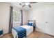 Bright bedroom featuring natural light, hardwood floors, and ceiling fan at 305 Forest Cir, Summerville, SC 29483