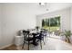 Dining area with patio access, bench seating and elegant finishes at 305 Forest Cir, Summerville, SC 29483