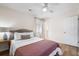Comfortable main bedroom, featuring a bed with decorative pillows and a side table with lamp at 305 Forest Cir, Summerville, SC 29483