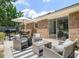 Inviting patio with comfortable seating, grill, and dining area, perfect for outdoor living at 305 Forest Cir, Summerville, SC 29483