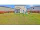 Expansive backyard with a screened-in porch, patio, and lawn extending to the fence at 307 Fox Gap Rd, Summerville, SC 29486