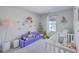 Cozy Bedroom with a sofa, a white crib, and colorful wall decorations, creating a comforting space at 307 Fox Gap Rd, Summerville, SC 29486