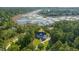 Stunning aerial view of the home and surrounding landscape featuring marsh views and mature trees at 3130 Pignatelli Cres, Mount Pleasant, SC 29466