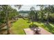 A spacious backyard features a deck with seating and a distant view of the waterfront at 3130 Pignatelli Cres, Mount Pleasant, SC 29466