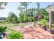 Enjoy the scenic views of the lush backyard and waterfront from the spacious outdoor deck at 3130 Pignatelli Cres, Mount Pleasant, SC 29466