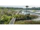 A tranquil waterscape featuring a private wooden dock and marsh grasses at 3130 Pignatelli Cres, Mount Pleasant, SC 29466