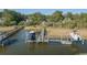 Private boat dock with boat lift on scenic waterfront perfect for boaters and water enthusiasts at 3130 Pignatelli Cres, Mount Pleasant, SC 29466