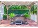 Private outdoor hot tub area with pergola offers a relaxing retreat amidst beautifully landscaped surroundings at 3130 Pignatelli Cres, Mount Pleasant, SC 29466