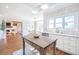 Bright kitchen featuring stainless steel appliances and views into the living and dining rooms at 3130 Pignatelli Cres, Mount Pleasant, SC 29466