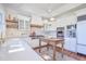 Well-appointed kitchen featuring white cabinets, stainless appliances, and a butcher block island at 3130 Pignatelli Cres, Mount Pleasant, SC 29466