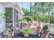 Relax on the deck at the ornate wrought iron table, perfect for outdoor dining and entertaining guests at 3130 Pignatelli Cres, Mount Pleasant, SC 29466