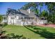 Enjoy the privacy of this property, with a large deck, a white picket fence and mature tree coverage at 3130 Pignatelli Cres, Mount Pleasant, SC 29466