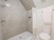 Tiled shower with built-in niche, shower curtain, and gray diamond pattern flooring at 3130 Pignatelli Cres, Mount Pleasant, SC 29466