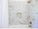 The shower features white and brown marble tiling and a built-in soap holder at 3130 Pignatelli Cres, Mount Pleasant, SC 29466