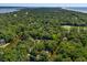 Panoramic aerial view of a coastal community featuring a golf course, river, and the ocean at 33 Painted Bunting Ln, Kiawah Island, SC 29455