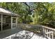 Back deck featuring a view of the river surrounded by lots of trees at 33 Painted Bunting Ln, Kiawah Island, SC 29455