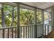 View from the balcony showing the lush greenery and the river at 33 Painted Bunting Ln, Kiawah Island, SC 29455