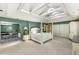 Large bedroom with a vaulted ceiling, bed, walk-in closet, and ensuite bathroom at 33 Painted Bunting Ln, Kiawah Island, SC 29455