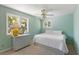 This bedroom has a ceiling fan and lots of natural light at 33 Painted Bunting Ln, Kiawah Island, SC 29455