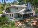 Charming home featuring a screened porch and backyard deck nestled in a serene wooded setting at 33 Painted Bunting Ln, Kiawah Island, SC 29455