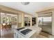 Open kitchen with stainless steel appliances seamlessly connected to the dining and living areas at 33 Painted Bunting Ln, Kiawah Island, SC 29455