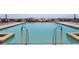 Refreshing outdoor pool with a serene atmosphere, steel handles, and peaceful views at 33 Painted Bunting Ln, Kiawah Island, SC 29455