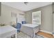 Cozy bedroom featuring a desk, blue accents, and natural light at 3428 Plaza Ln, North Charleston, SC 29420