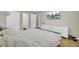 Spacious bedroom with a cozy bed, a dresser, and an entertainment center at 3428 Plaza Ln, North Charleston, SC 29420