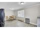 Cozy dining area with a round table, four chairs, and view of the kitchen at 3428 Plaza Ln, North Charleston, SC 29420