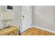 Welcoming entryway with wood floors and front door at 3428 Plaza Ln, North Charleston, SC 29420
