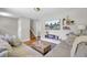 Cozy living room with modern decor, a sectional sofa and hardwood floors at 3428 Plaza Ln, North Charleston, SC 29420